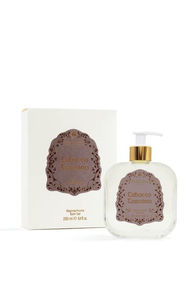 Tobacco toscano bottle of bath gel on plain white studio background. Box has a floral design